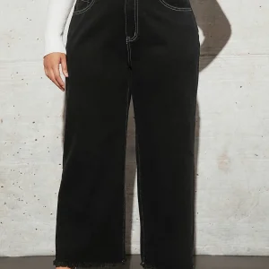 Vaqueros de pernera ancha con ribete sin rematar y talle alto